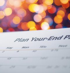 Team planning a year-end office party using calendar invites for easy scheduling